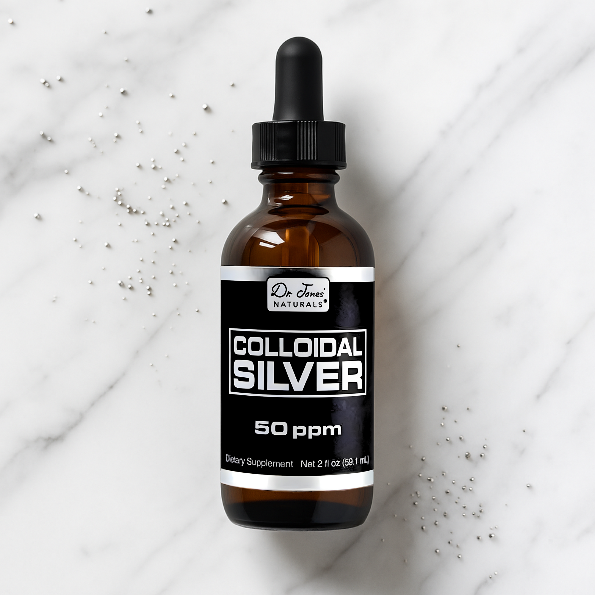 Bottle of colloidal silver on a marble surface
