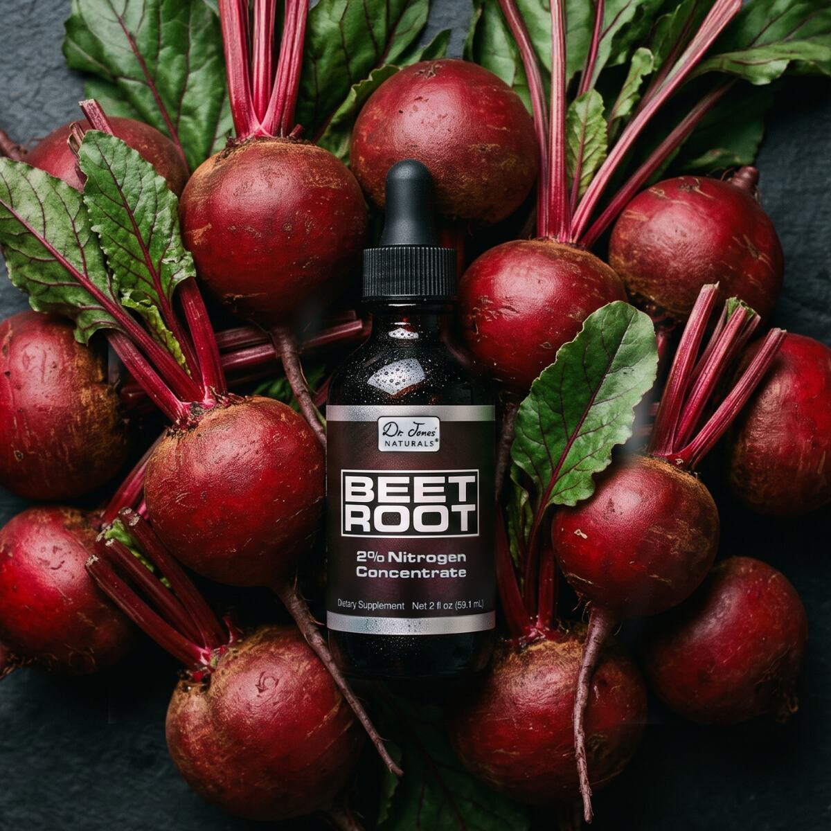 Bottle of BeetRoot 2% Nitrogen Concentrate on a pile of fresh beets